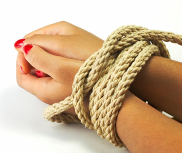 Rope Tied Around a Woman's Wrists